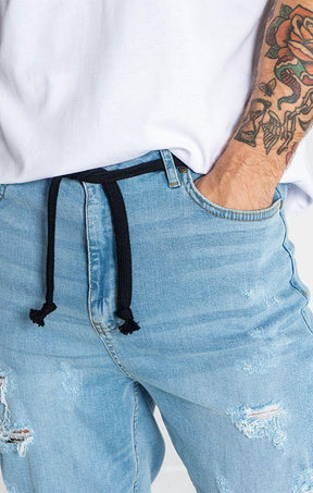 jeans / Light Blue Raw Carrot Jeans